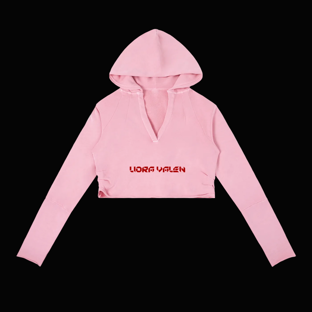 Pink cropped hoodie with 'Liora Valen' branding on a white background